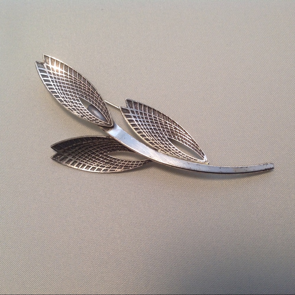 Mid Century Sterling lapel pin by "Beau" Co.